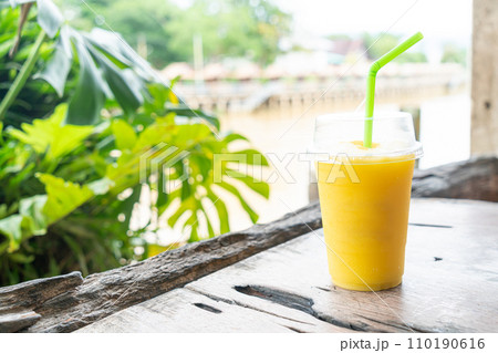 mango smoothies in take away glass mango smoothies in take away glass 110190616