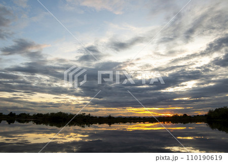 colorful dramatic sky with cloud at sunset colorful dramatic sky with cloud at sunset 110190619