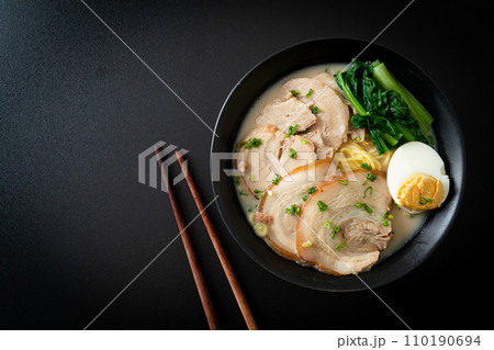 Ramen noodles in pork bone soup with roast pork and egg 110190694