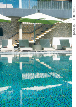 bed pool with umbrella around swimming pool bed pool with umbrella around swimming pool 110190829