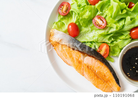 grilled salmon fillet steak with salad grilled salmon fillet steak with salad 110191068