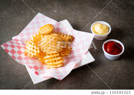 waffle fries with ketchup and mayonnaise waffle fries with ketchup and mayonnaise 110191323