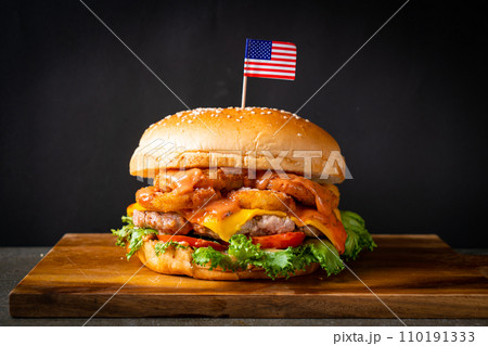 jumbo or giant burger - pork with cheese and fried nugget burger jumbo or giant burger - pork with cheese and fried nugget burger 110191333