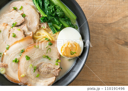Ramen noodles in pork bone soup with roast pork and egg 110191496