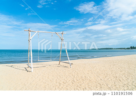 wooden swing on the beach wooden swing on the beach 110191506