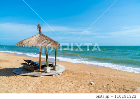 beach chair and umbrella with sea beach background 110191522