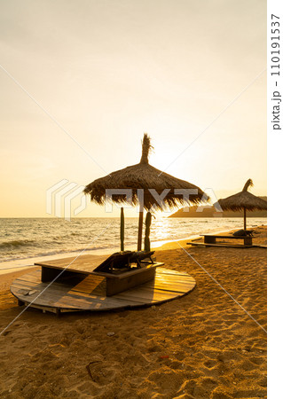 beach chair and umbrella with sea beach background 110191537