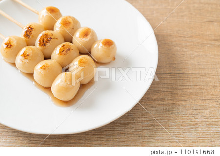 Mitarashi dango. Dumpling in a sweet soy sauce 110191668