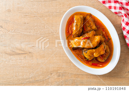 Redtail Catfish Fish in Dried Red Curry Sauce that called Choo Chee Redtail Catfish Fish in Dried Red Curry Sauce that called Choo Chee 110191848