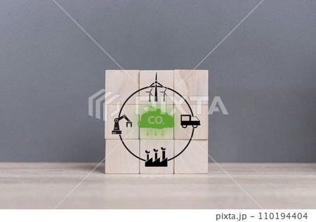 carbon neutral concept. Net zero greenhouse gas emissions target. wooden cubes with icon decrease carbon emission icon on the table. net zero emissions. Sustainable nature in the future. carbon neutral concept. Net zero greenhouse gas emissions target. wooden cubes with icon decrease carbon emission icon on the table. net zero emissions. Sustainable nature in the future. 110194404