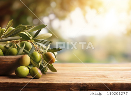 AI-generated content. Olive branches on old wooden table. Blurred mediterranean garden in sunset light. Copy space for text. AI generated AI-generated content. Olive branches on old wooden table. Blurred mediterranean garden in sunset light. Copy space for text. AI generated 110201277
