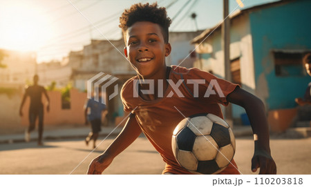 African American boy playing football in the local 110203818