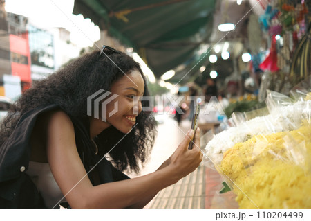 Asian woman enjoy travel in downtown district Asian woman enjoy travel in downtown district 110204499