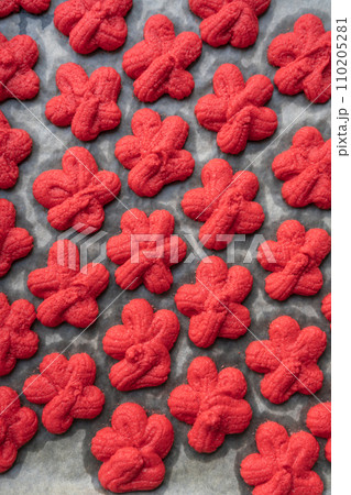 traditional Chinese New Year red sand cookie, symbolizing luck 110205281