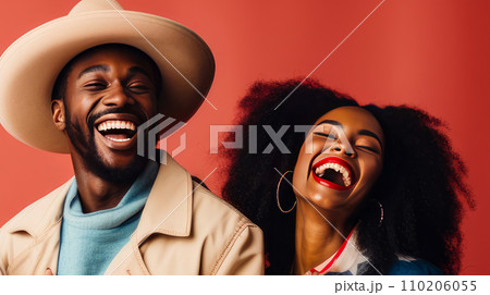 Happy two afro woman and man with American flag on the Independence Day holidays of the United States of America. 110206055