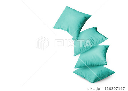 Stack of turquoise pillows isolated on white background Stack of turquoise pillows isolated on white background 110207147