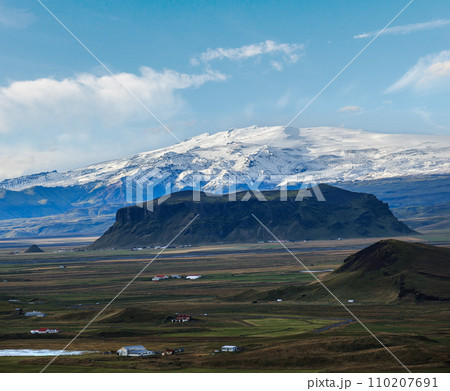 Picturesque autumn evening view to highlands and plain not far from ocean shore  from Dyrholaey Cape Viewpoint, Vik, South Iceland. 110207691