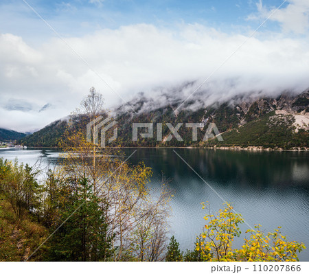 Mountain alpine autumn lake Achensee, Alps, Tirol, Austria. Mountain alpine autumn lake Achensee, Alps, Tirol, Austria. 110207866