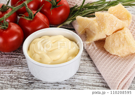 Cheese sauce in the bowl Cheese sauce in the bowl 110208595