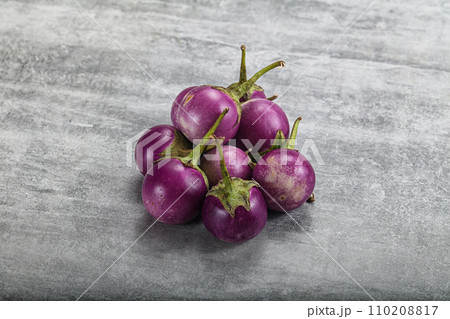 Raw small purple asian baby eggplant 110208817