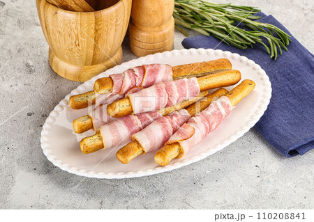 Crispy grissini italian bread with bacon 110208841
