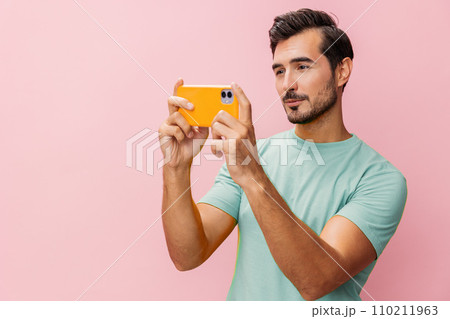 Man blogging cyberspace portrait happy lifestyle smile holding message communication phone background 110211963