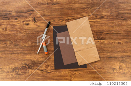 Flat lay. A dedicated teacher brings paper puppets to life, fostering creativity in the classroom through hands-on projects. Flat lay. A dedicated teacher brings paper puppets to life, fostering creativity in the classroom through hands-on projects. 110215303