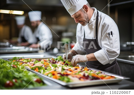 Talented Male Chef Skillfully Preparing and Cooking Gourmet Dishes in a Modern Kitchen Setting 110220007