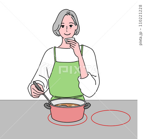料理中に味見するシニア女性 料理中に味見するシニア女性 110221228