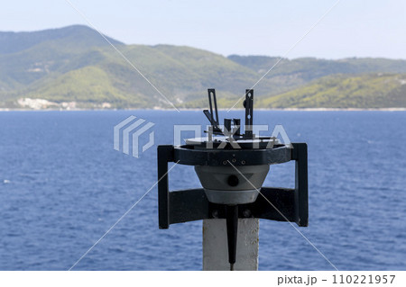 Azimuth ring on gyro compass. Direction finder on the navigational bridge. Azimuth vane. Bearing finder. Navigational equipment. Azimuth ring on gyro compass. Direction finder on the navigational bridge. Azimuth vane. Bearing finder. Navigational equipment. 110221957