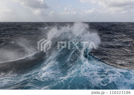 Big waves with beautiful lighting. Stormy sea, Bad weather. Gale. Rough sea. Beaufort scale 6. Big waves with beautiful lighting. Stormy sea, Bad weather. Gale. Rough sea. Beaufort scale 6. 110223186