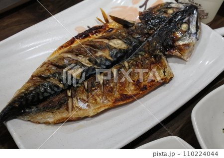 Korean food. Grilled mackerel on a plate Korean food. Grilled mackerel on a plate 110224044