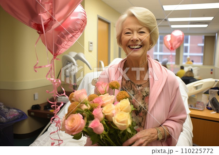 Happy Senior Woman Smiling and Embracing the Delicate Beauty of Pink Roses in a Serene Hospital Room Happy Senior Woman Smiling and Embracing the Delicate Beauty of Pink Roses in a Serene Hospital Room 110225772