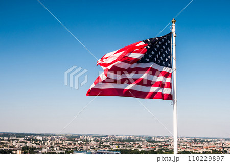 american flag waving in the sky 110229897