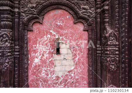 Wall with details of traditional Nepalese temple 110230134
