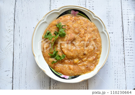 Pea porridge in a plate on the table. Pea porridge in a plate on the table. 110230664