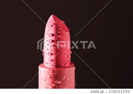 Red lipstick with water drops on a dark background. 110231150