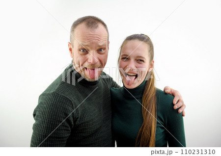 show tongues stick out tongues look into frame bulge eyes make faces have fun husband and wife one satan apple from apple tree not far from falls joke nothing you will not succeed long hair grimace 110231310