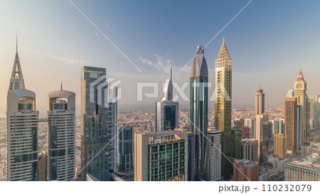 Skyline panoramic view of the high-rise buildings on Sheikh Zayed Road in Dubai aerial timelapse, UAE. Skyline panoramic view of the high-rise buildings on Sheikh Zayed Road in Dubai aerial timelapse, UAE. 110232079