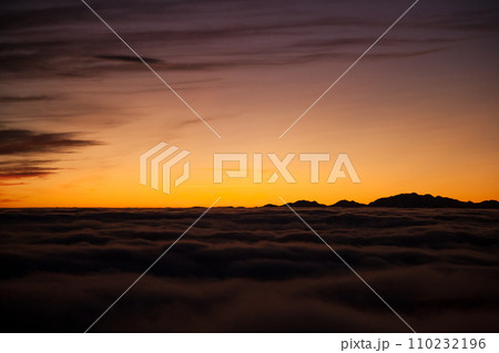 Spectacular sunset over a sea of clouds Spectacular sunset over a sea of clouds 110232196