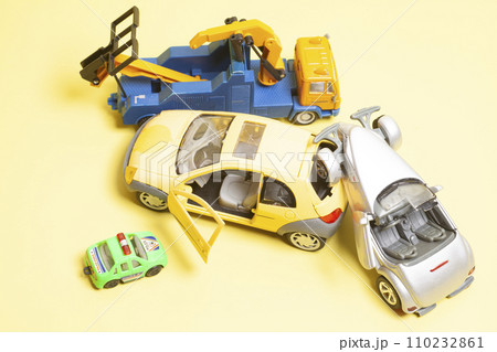 Car crash accident on a yellow background. Insurance concept. 110232861