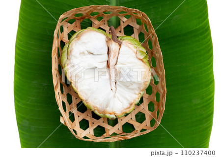 Custard apple fruit on banana leaf Custard apple fruit on banana leaf 110237400