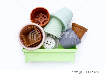 Plastic plant pots, containers on white background. 110237668
