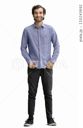 full-length portrait of a young man. standing isolated on white background full-length portrait of a young man. standing isolated on white background 110243692