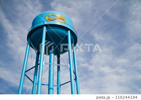 Blue Allegan Downtown Water Tower Under a Cloudy Sky 110244194