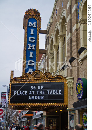 Vintage Michigan Theater Marquee in Bustling Urban Setting 110244196