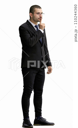 young man in full growth. isolated on white background showing with finger to keep quiet 110244360