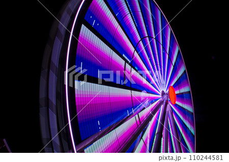 Neon Lights Ferris Wheel in Motion at Tennessee Night 110244581