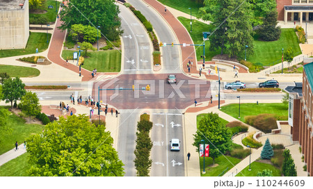 Students at Ball State University crossroad with pedestrians at intersection aerial, Muncie, IN Students at Ball State University crossroad with pedestrians at intersection aerial, Muncie, IN 110244609