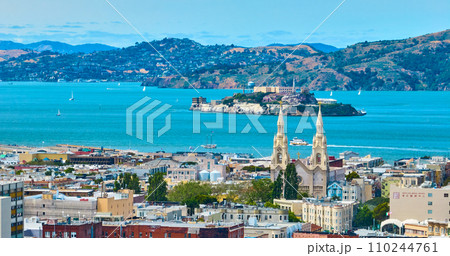 Residential San Francisco aerial of Alcatraz Island in bay water, CA 110244761